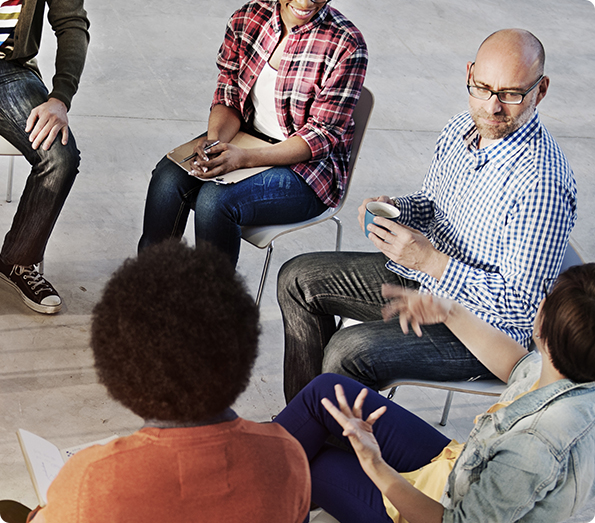 group of people attending open courses and discussing health and safety